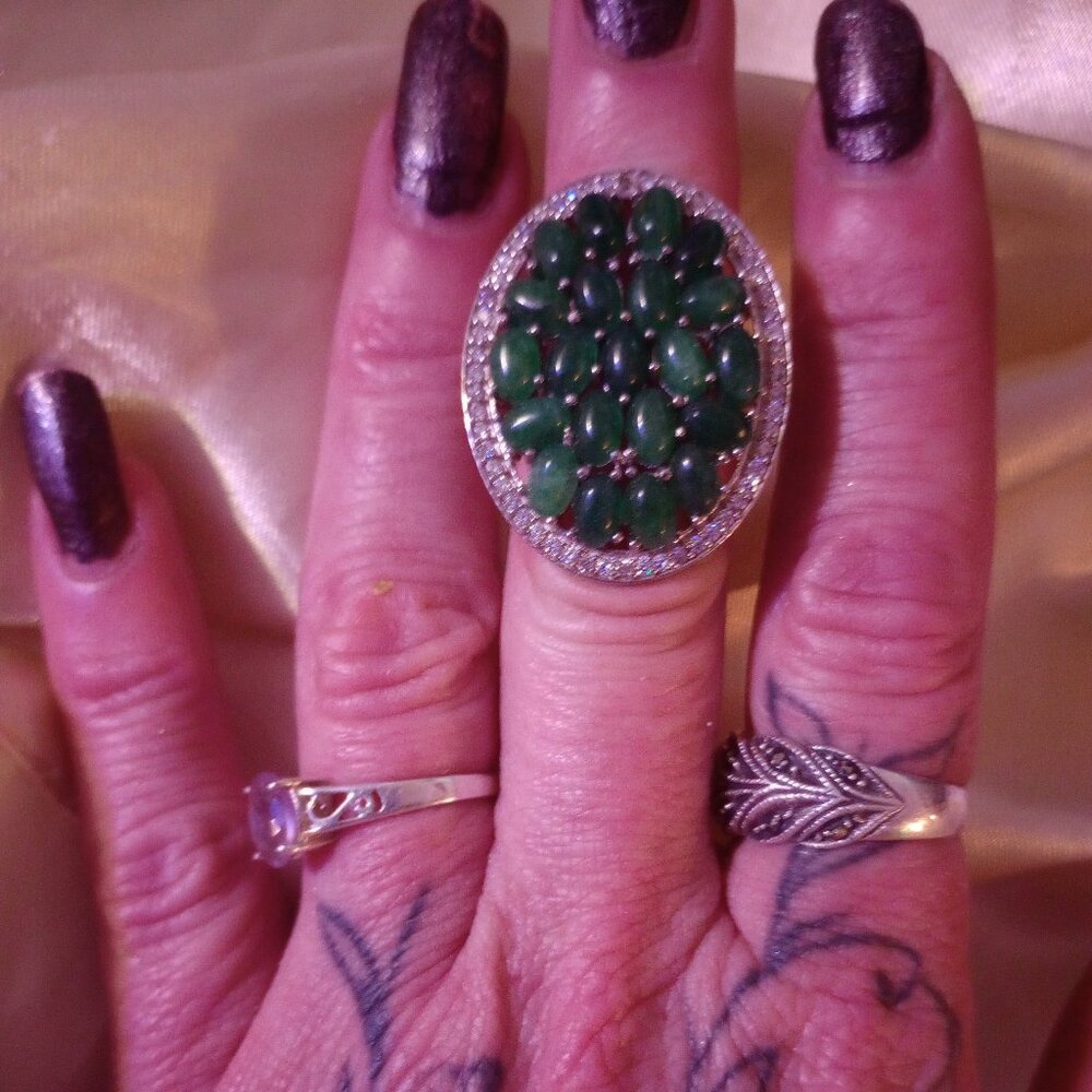 .025 stearling silver and emerald ring